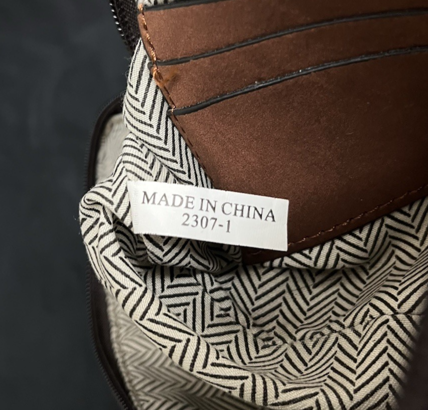 Cow Print Tassel Hand Clutch with Braided Bangle 10.75"