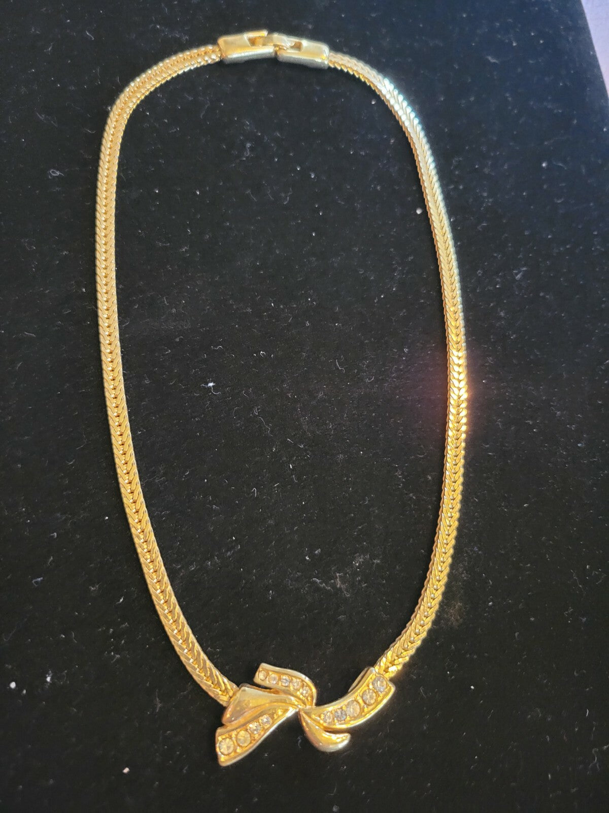 Vtg Monet 16" gold tone necklace Swirl Rhinestones Ribbon Thin Herringbone Chain