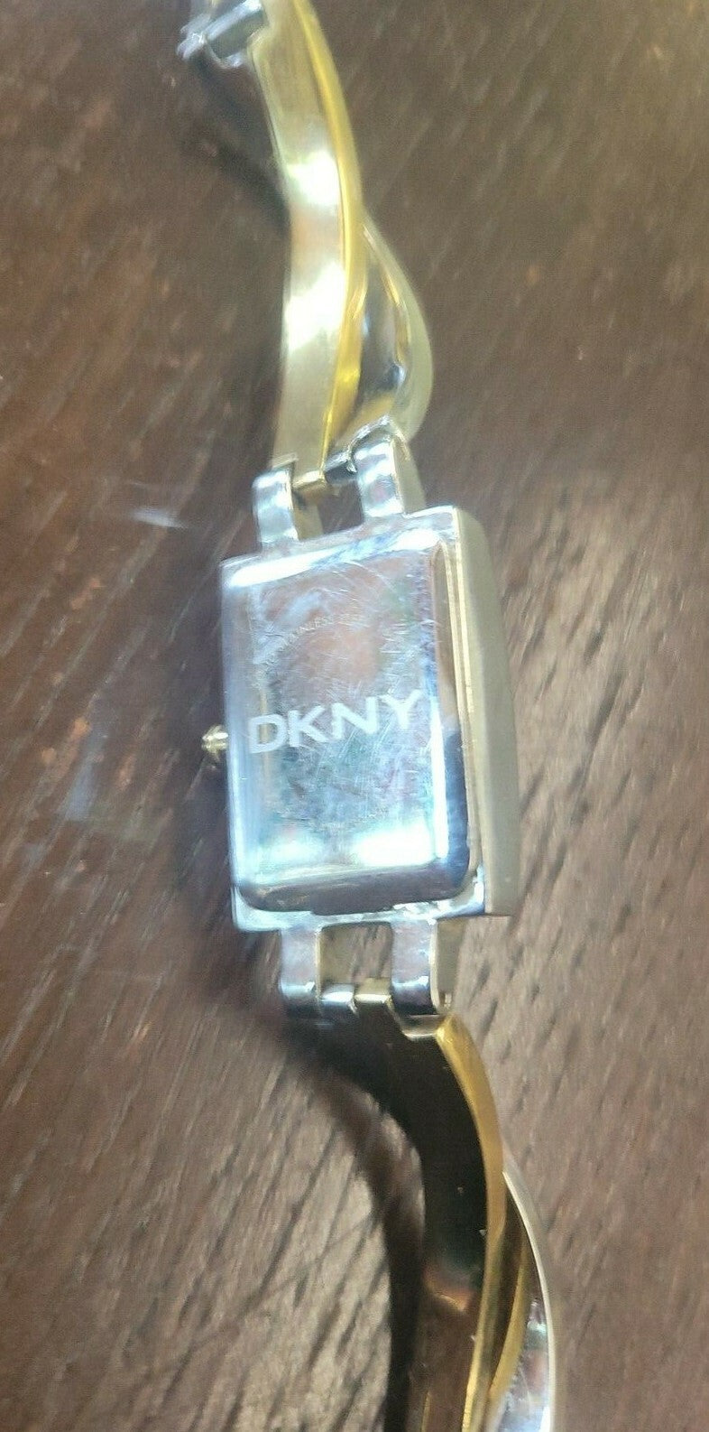 DKNY NY 3638 Ladies Two Tone Twist Steel Bracelet Watch