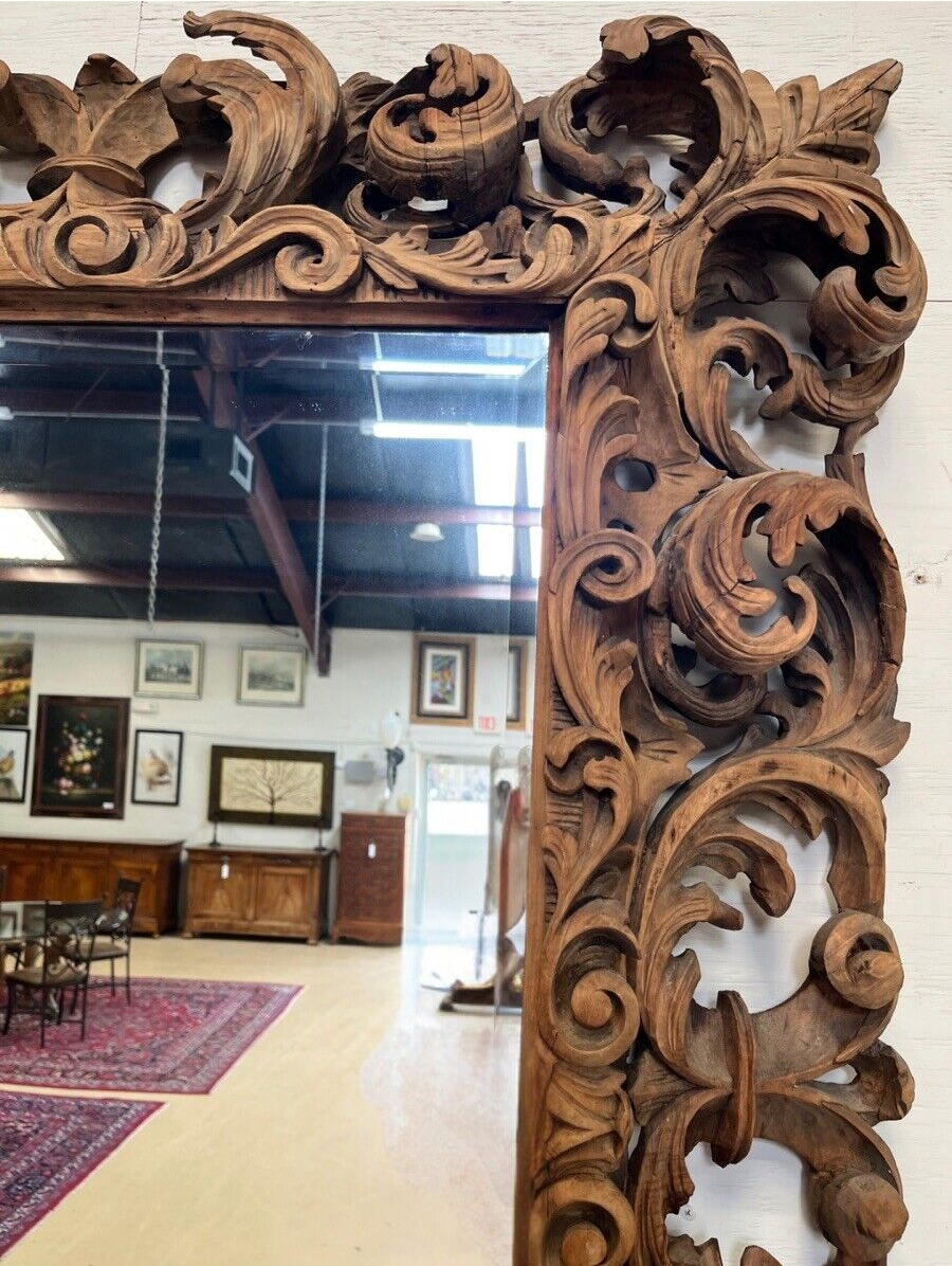 ORNATE BAROQUE STYLE SCROLLED FOLIATE CARVED MIRROR, 46"H