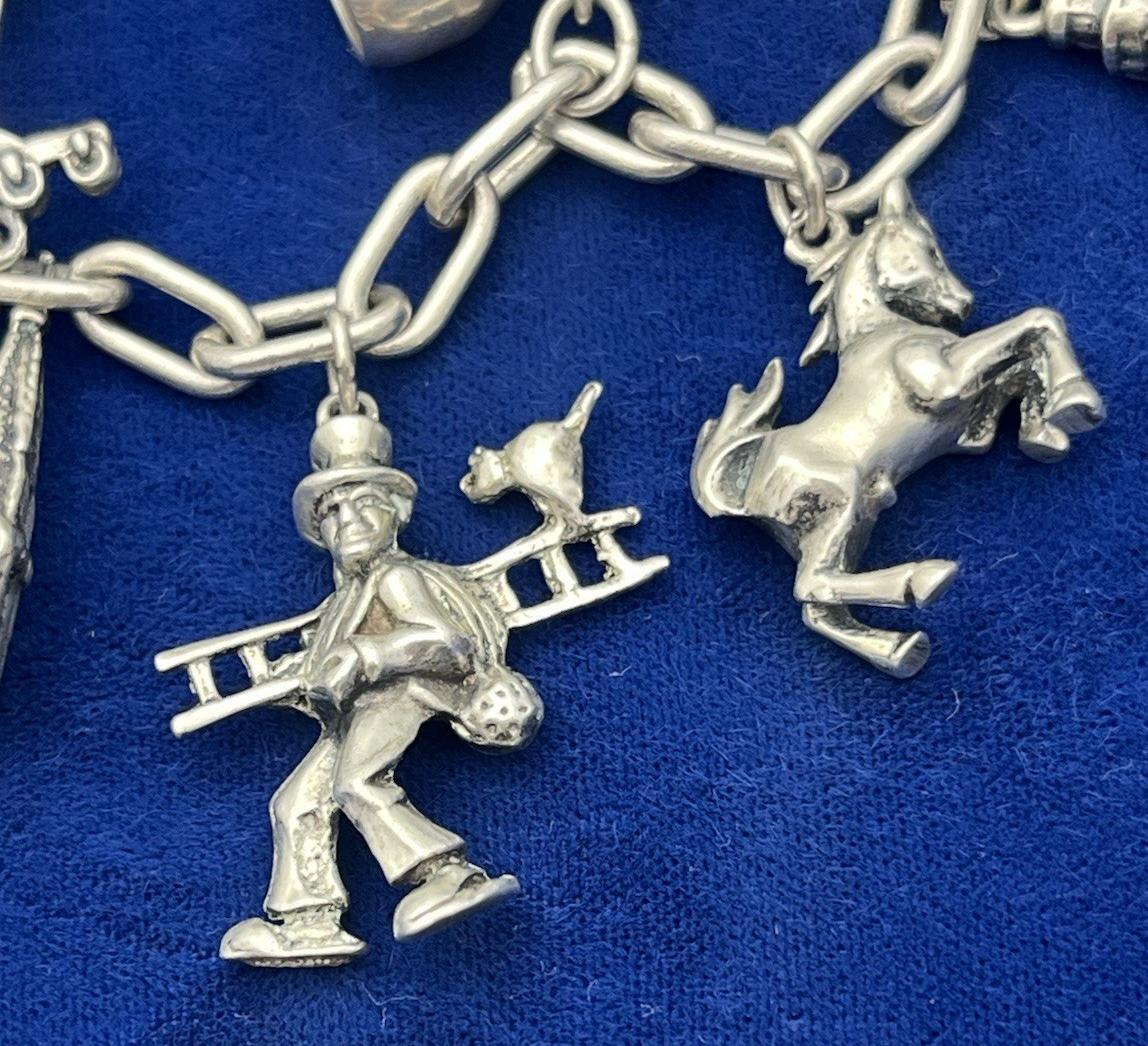 Vintage German 835 Sterling Silver Charm Bracelet  12 Charms 7 3/8 in Length
