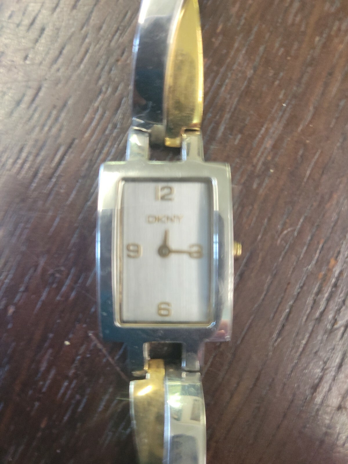 DKNY NY 3638 Ladies Two Tone Twist Steel Bracelet Watch