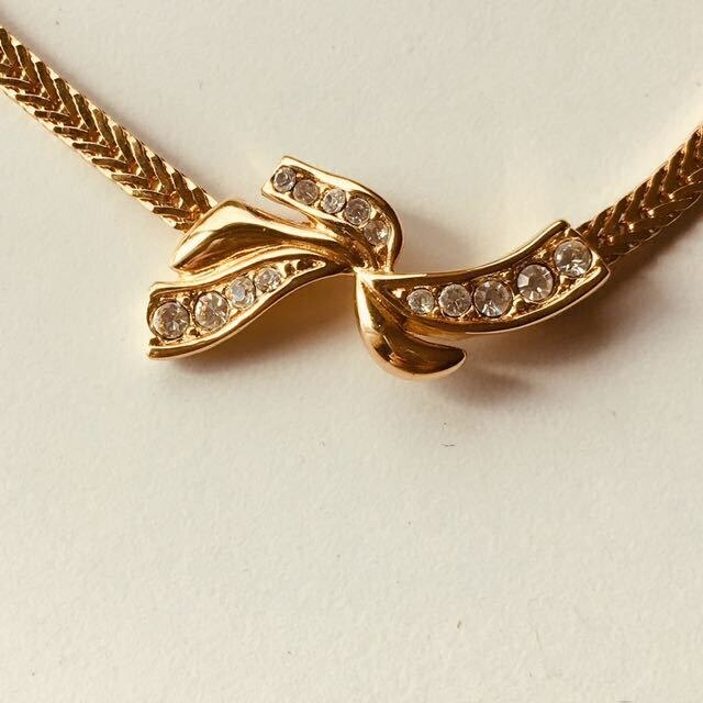 Vtg Monet 16" gold tone necklace Swirl Rhinestones Ribbon Thin Herringbone Chain