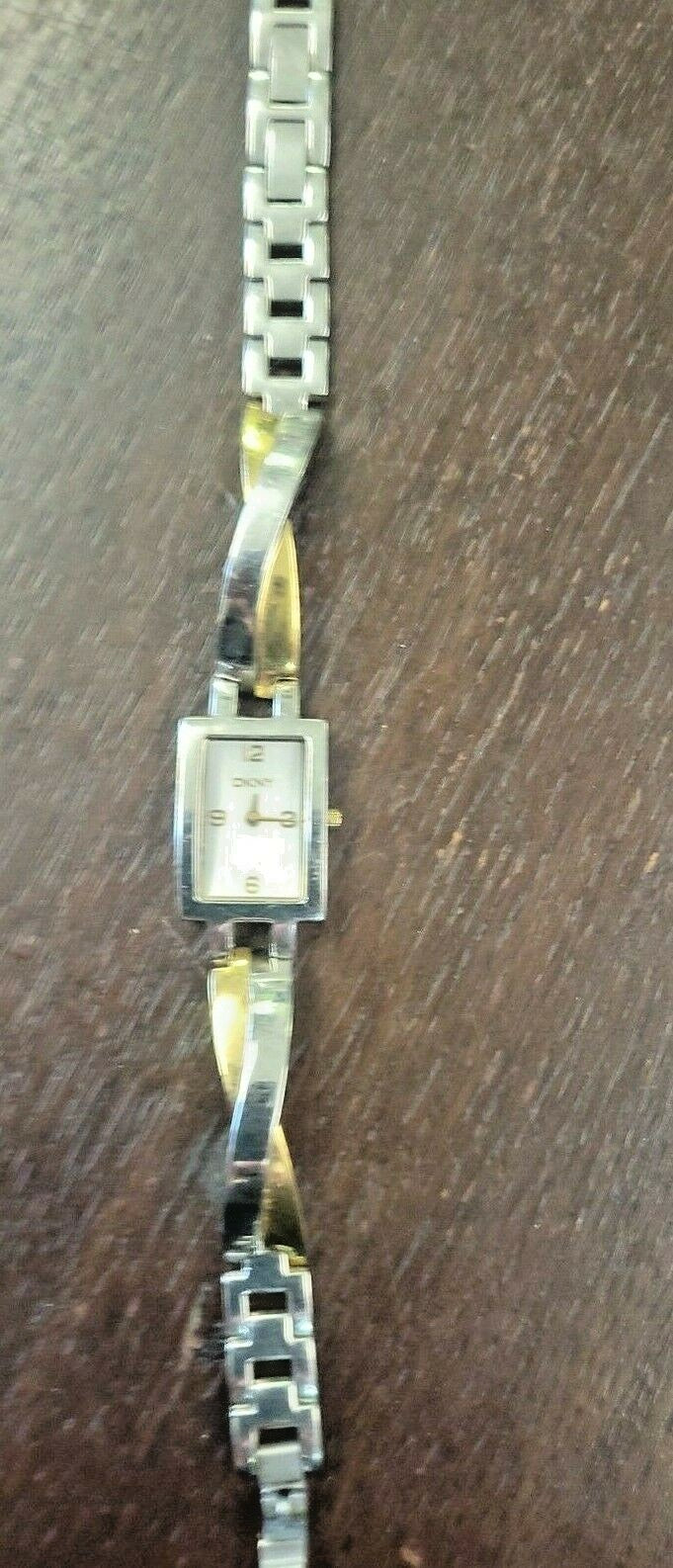 DKNY NY 3638 Ladies Two Tone Twist Steel Bracelet Watch