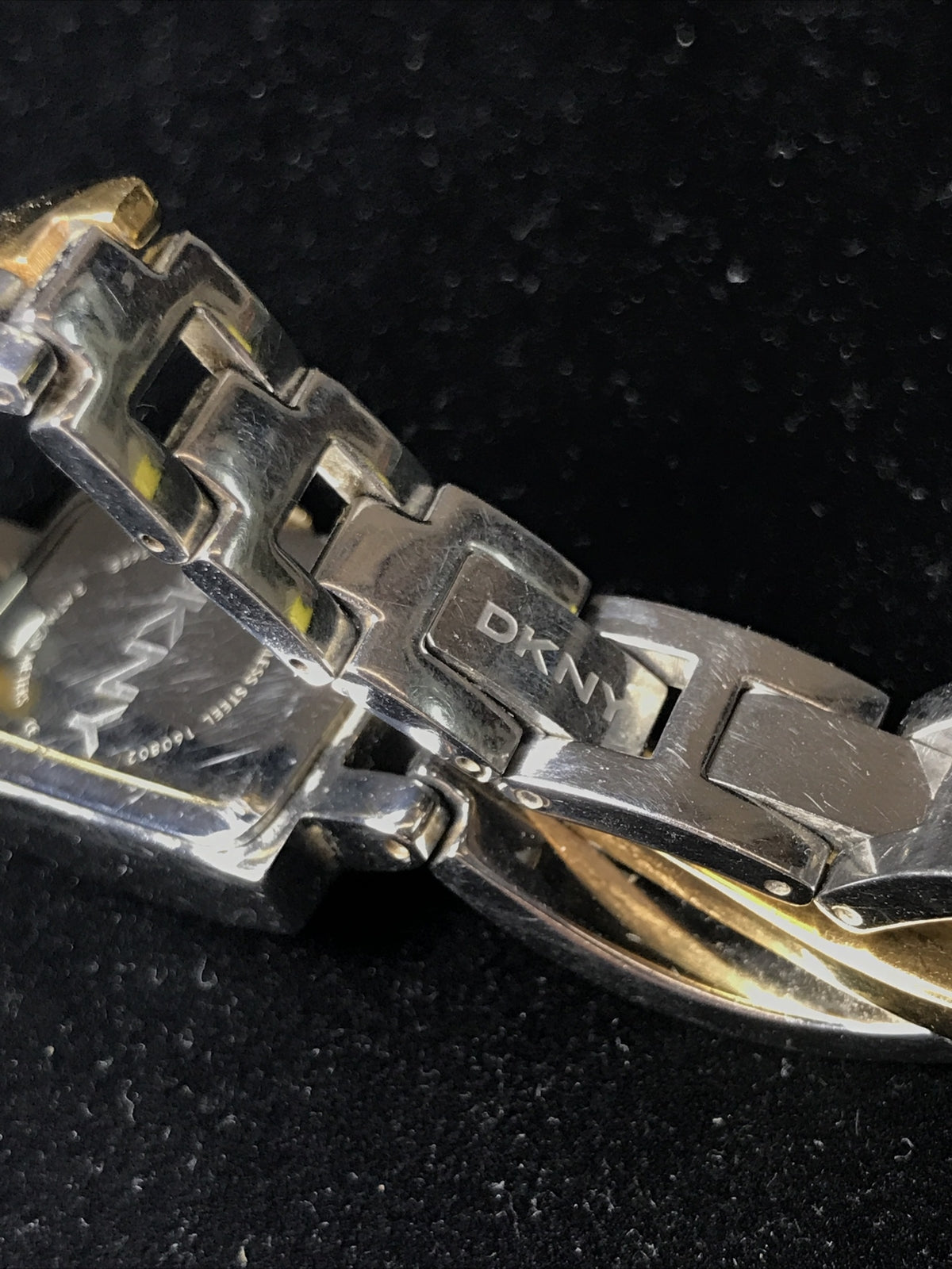 DKNY NY 3638 Ladies Two Tone Twist Steel Bracelet Watch