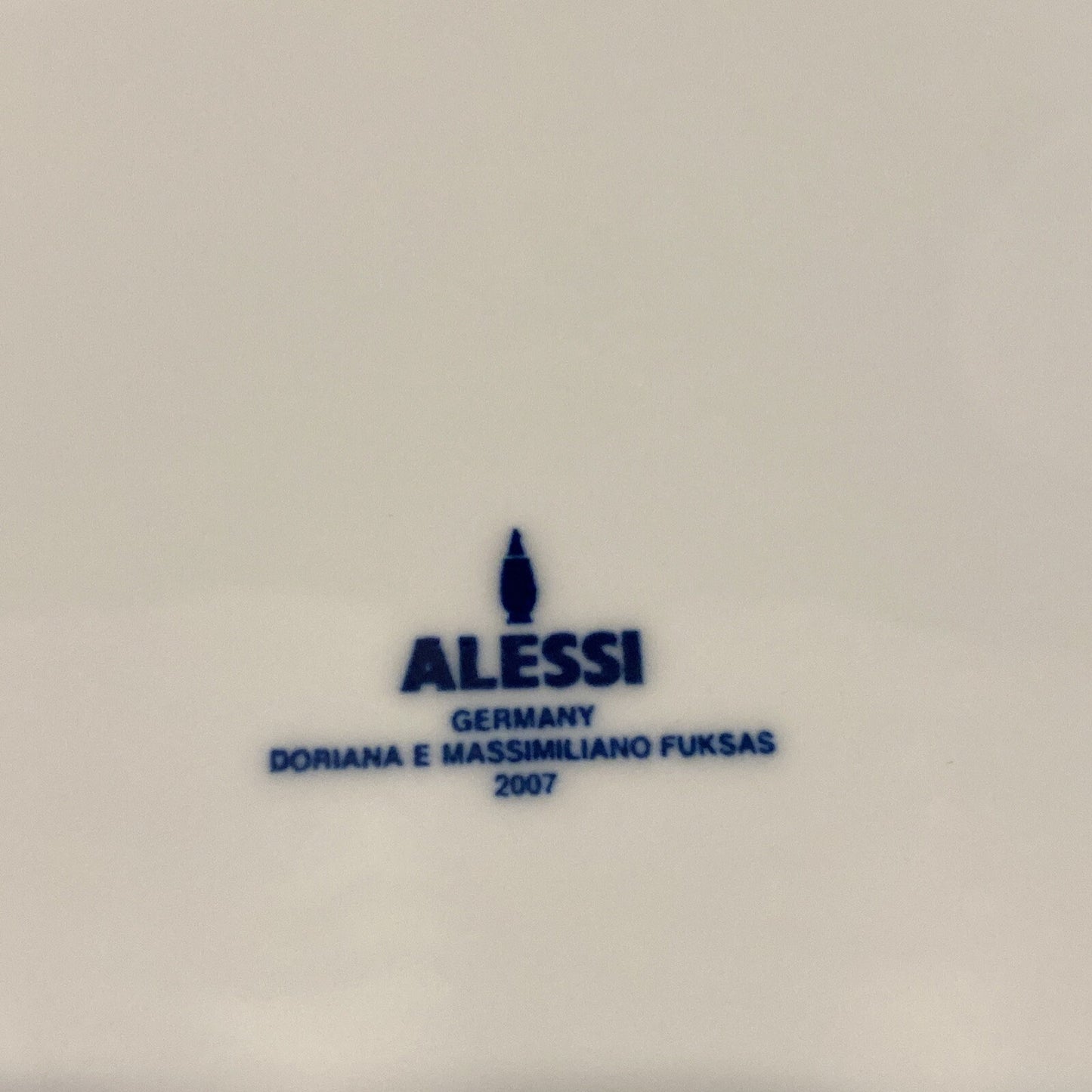 Alessi “Colombina” White Porcelain Dinner Plate & Black  Melamine Placemat