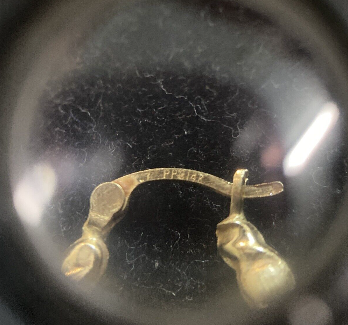 1.2g 14K Yellow Gold Oval Shaped Hoop Earrings