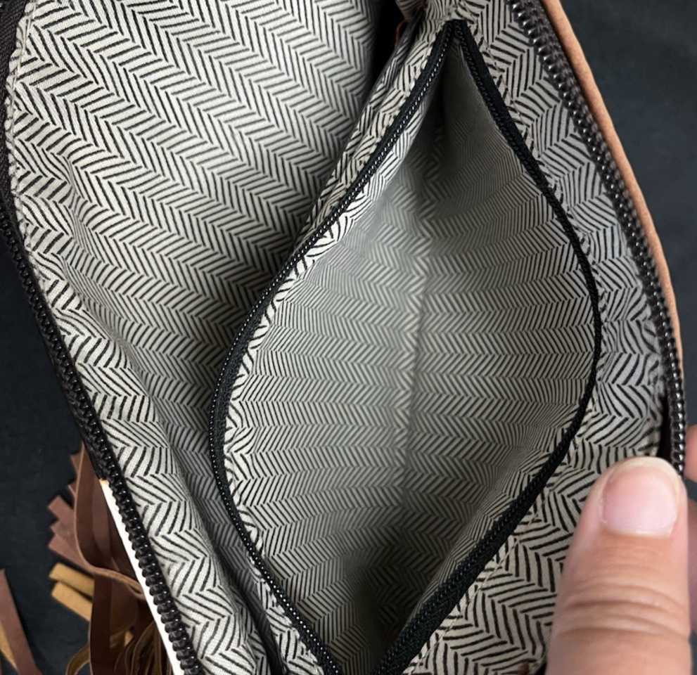 Cow Print Tassel Hand Clutch with Braided Bangle 10.75"