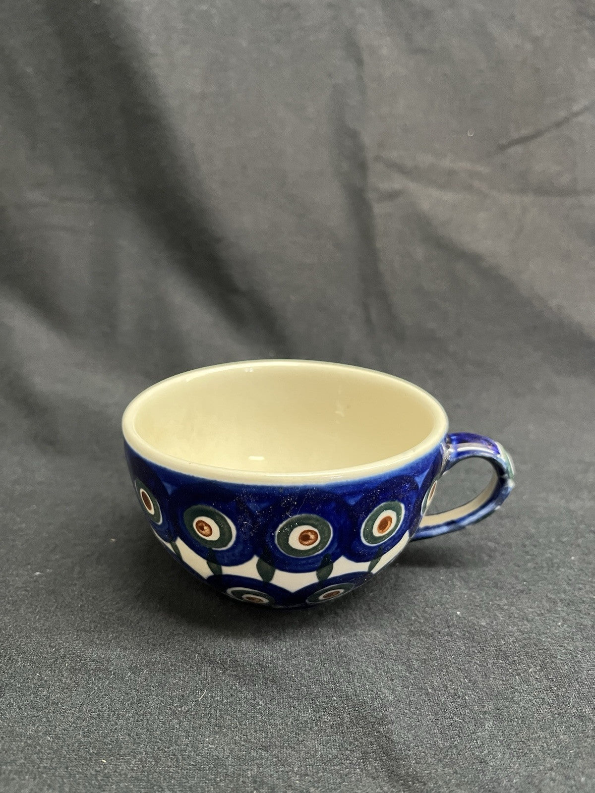 Boleslawiec Polish Pottery Cup and Saucer, Peacock Pattern