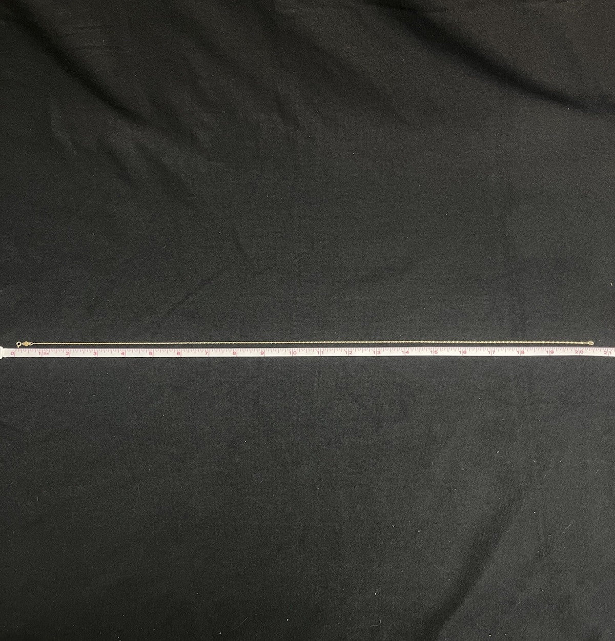 14k yellow gold rope  20 in chain  1 mm   weighs 2 g  marked AT in a circle