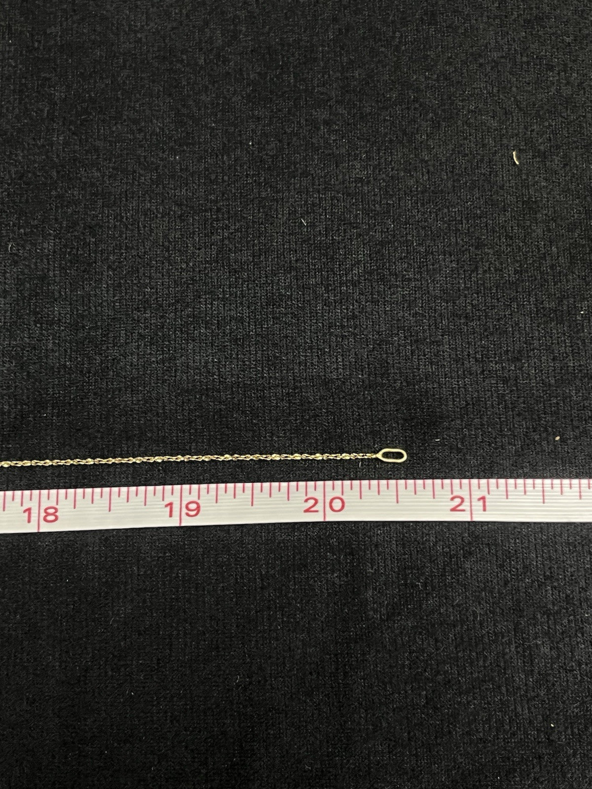 14k yellow gold rope  20 in chain  1 mm   weighs 2 g  marked AT in a circle