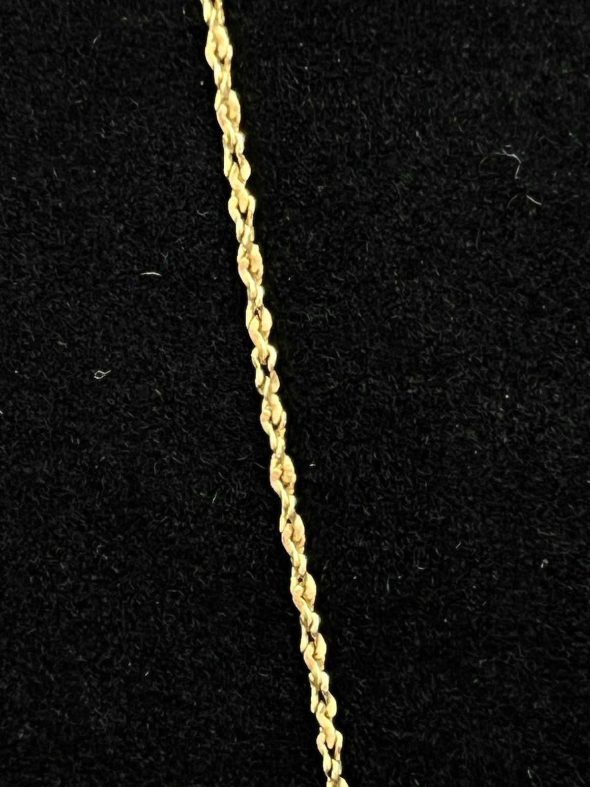 14k yellow gold rope  20 in chain  1 mm   weighs 2 g  marked AT in a circle